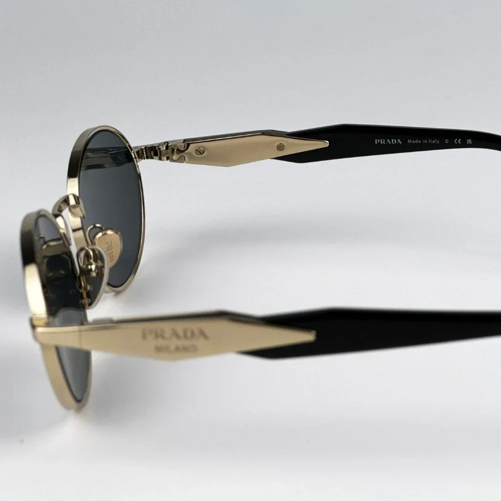 Prada PR65ZS ZVN09T Sunglasses Pale Gold Dark Grey Oval Metal Unisex